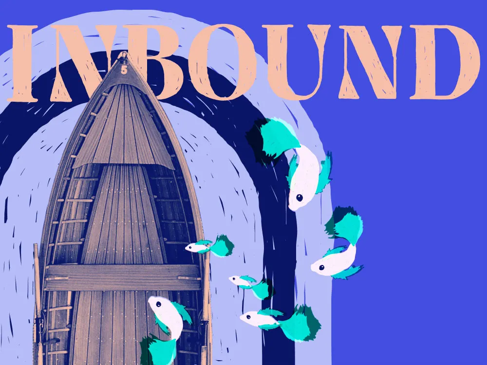 the text inbound over a boat with fish jumping inside