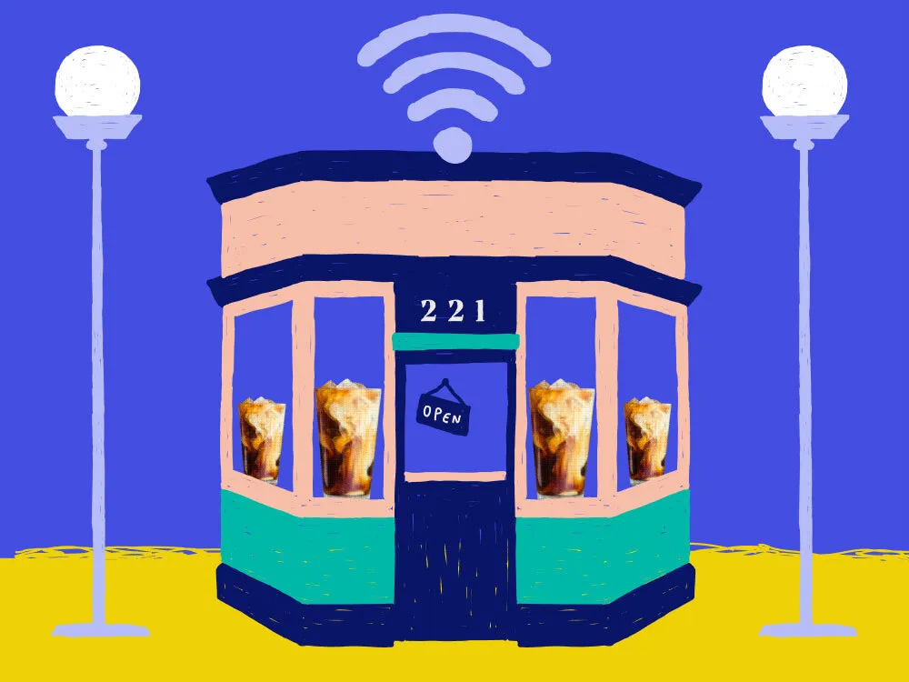 a storefront with iced coffees in the window