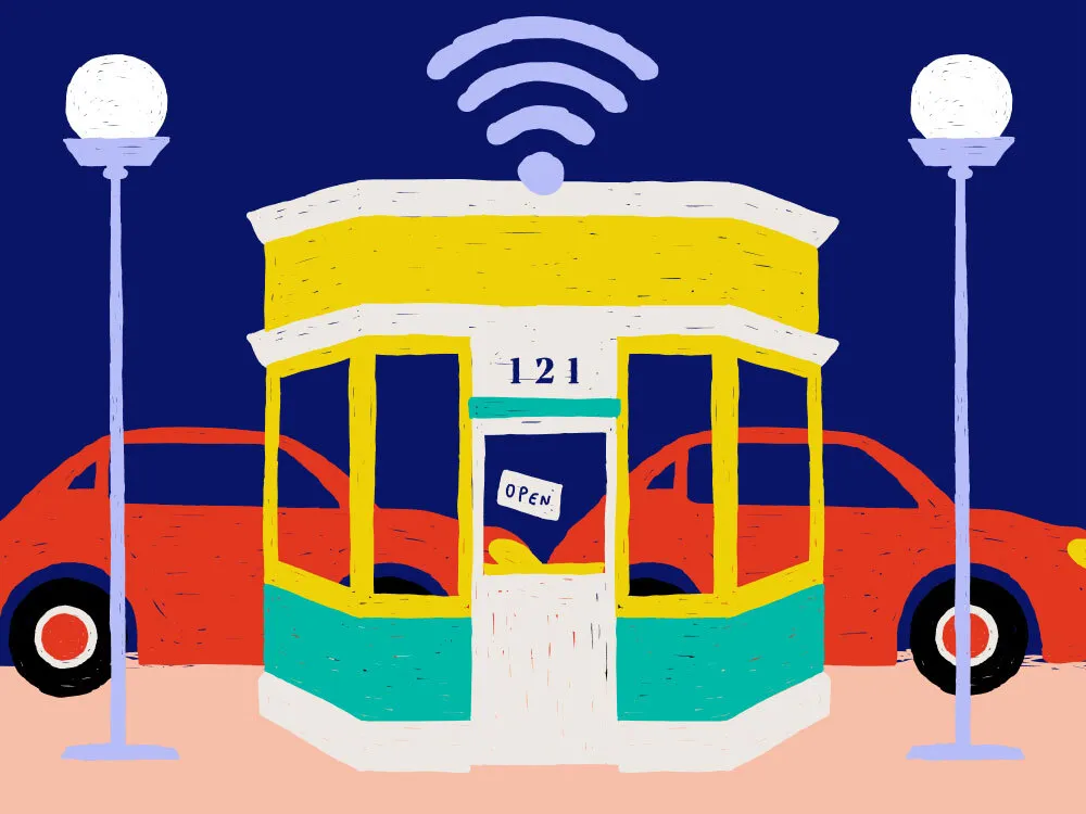 a storefront with cars lined up behind it