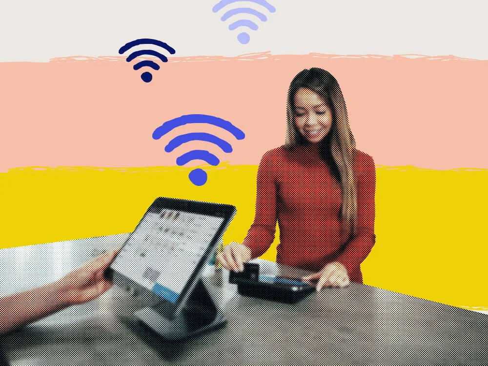 a woman interacting with a POS system