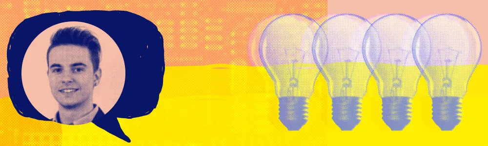 matt merrifiled smiling next to a banner of lightbulbs