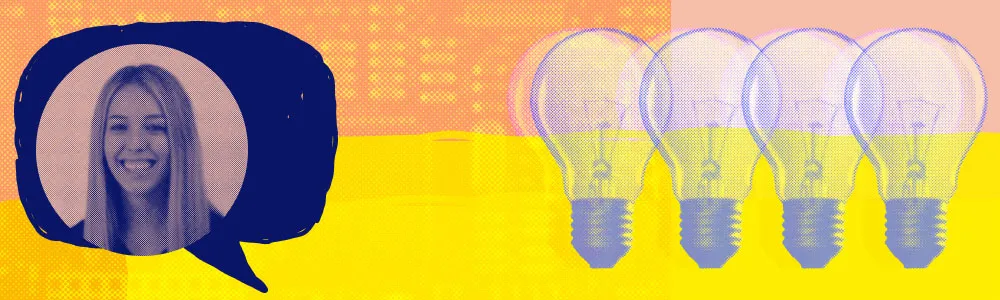 olivia folick smiling next to a banner of lightbulbs