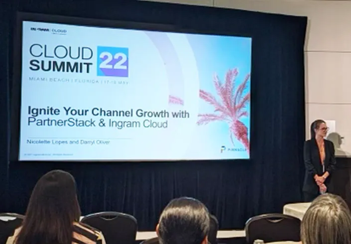 Projection screen featuring Cloud Summit 2022 with text that reads Ignite Your Channel Growth with 91大神 and Ingram Cloud