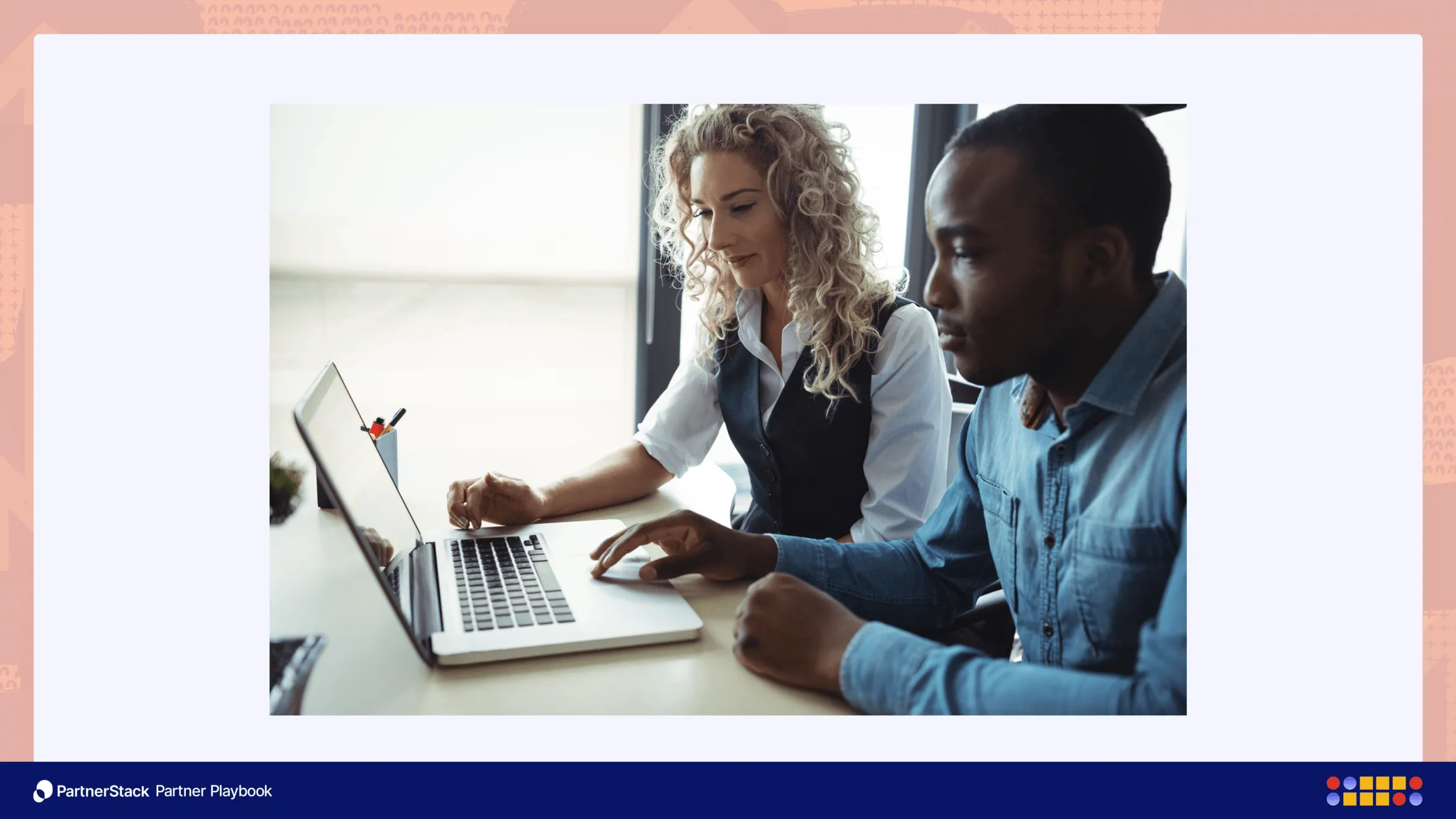 Stock of people looking at a screen together, like they’re collaborating on a new product