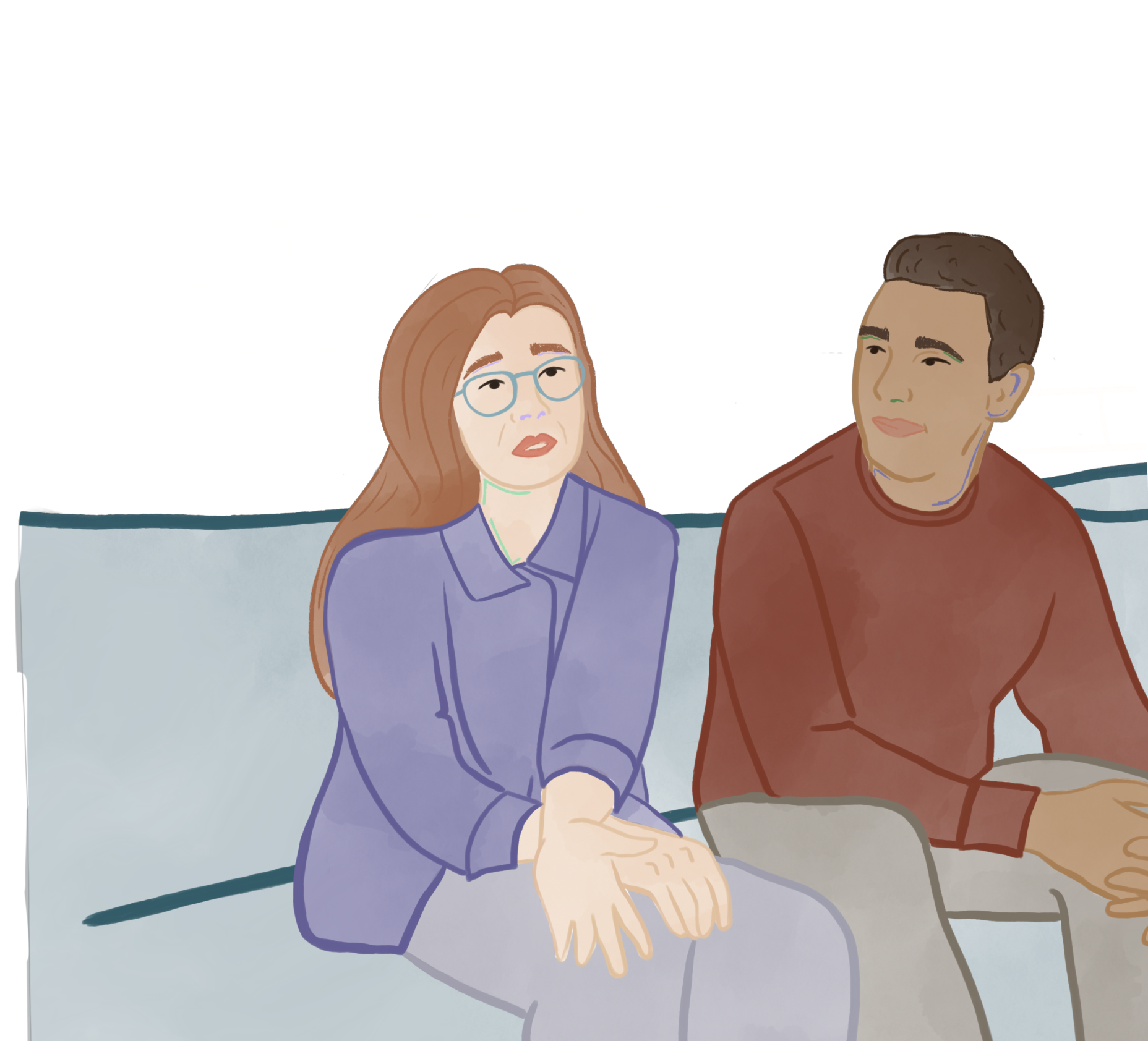 Couple sitting on a couch attending couples therapy