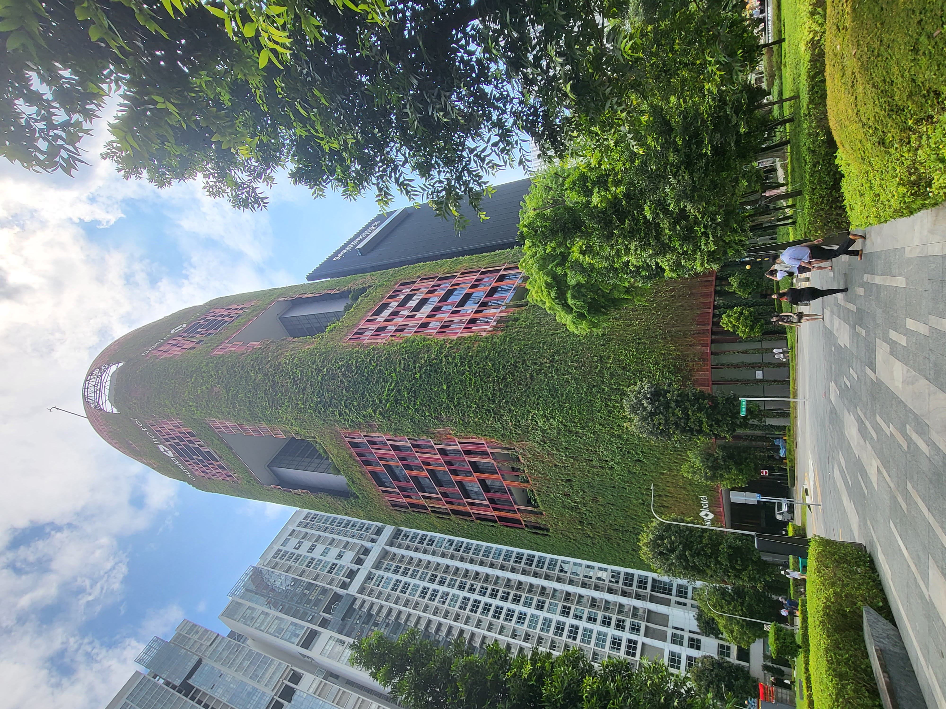 A tower covered in greenery