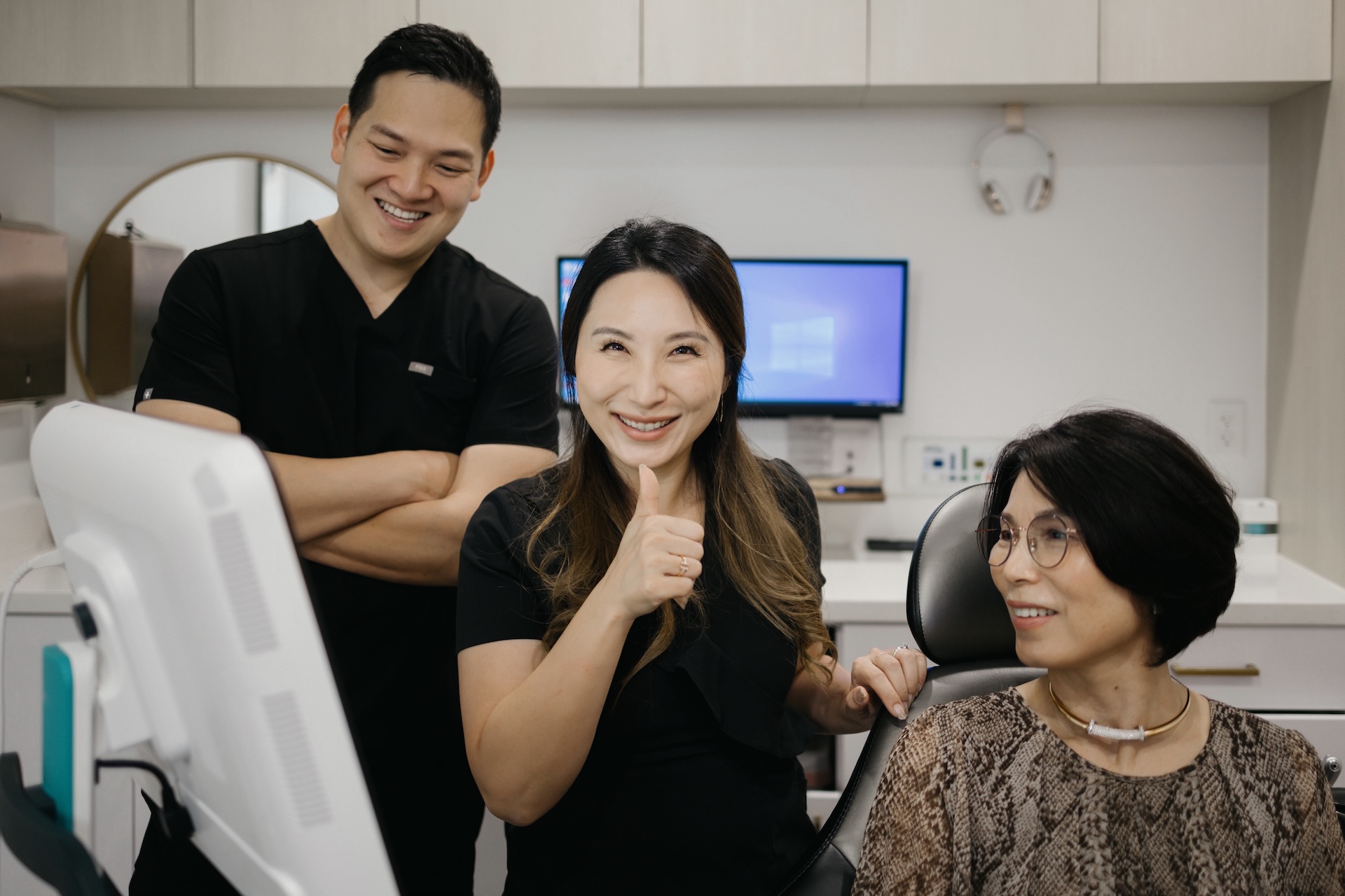 Our dentists explaining the procedure of a teeth cleaning to a patient