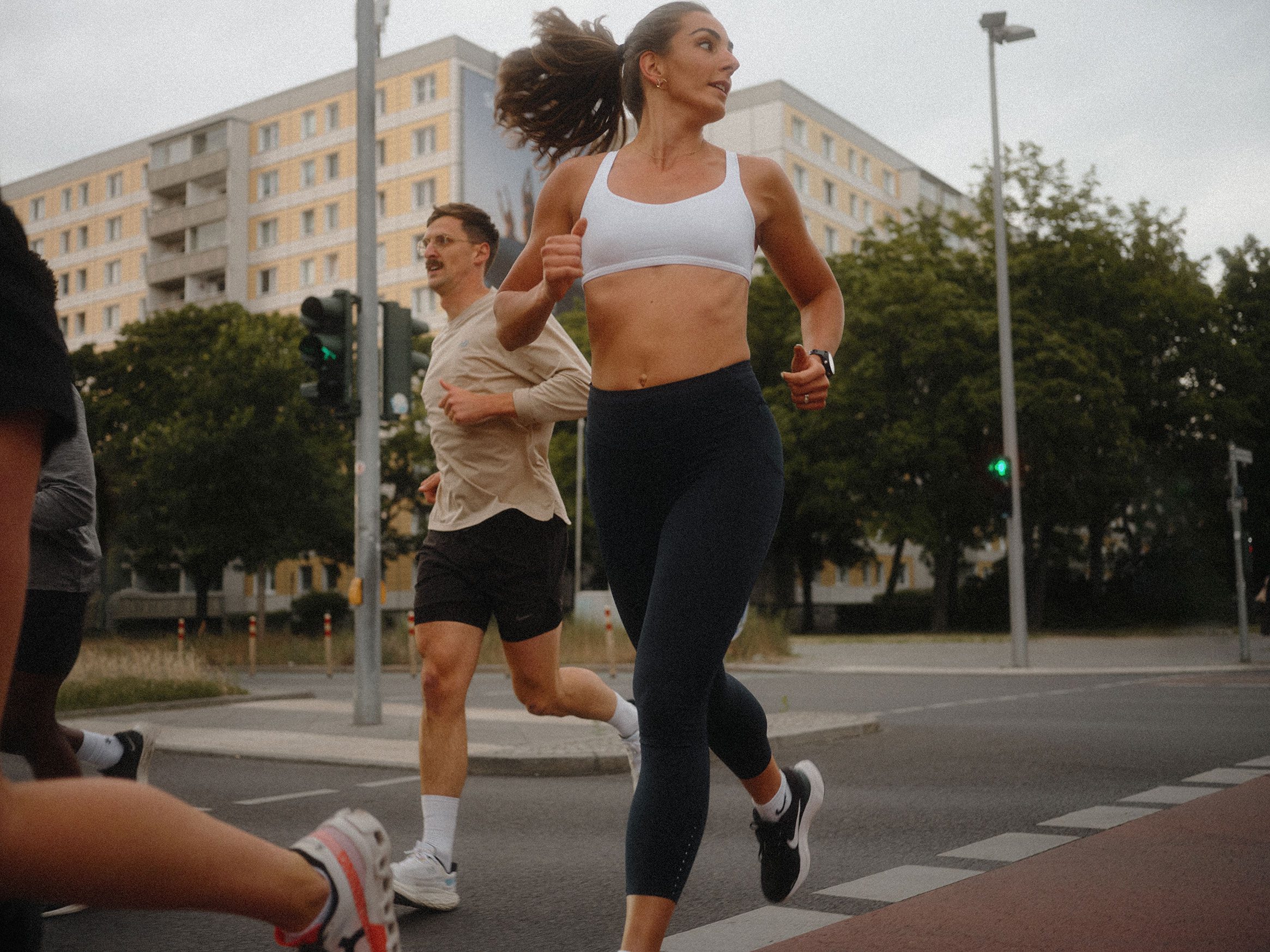 Trait Run Crew crossing the street