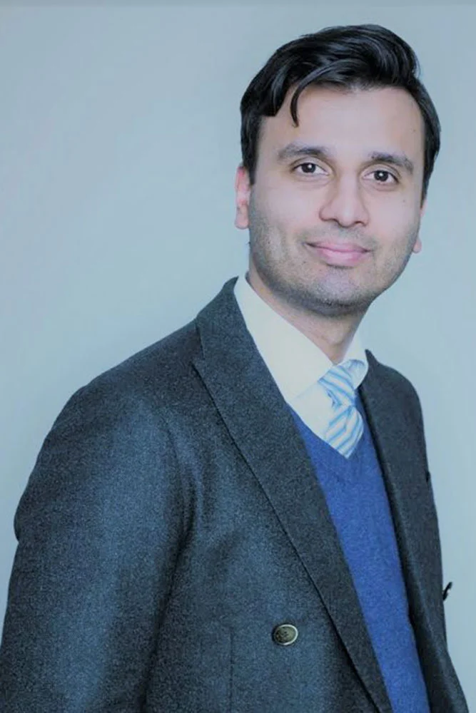 Dr Raindi
