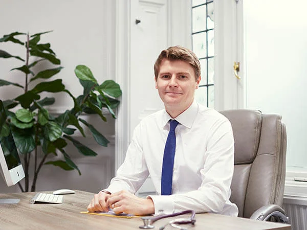 Dr Adam Hazell