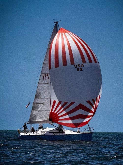 A J/24 sailboat racing