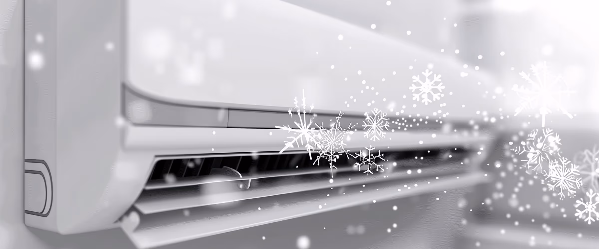 Close-up van een airco die koude lucht blaast, weergegeven met sneeuwvlok-illustraties.
