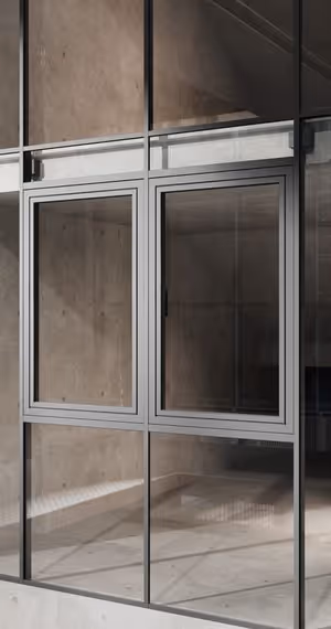 Modern glass window with metal frame reflecting concrete walls and floor in a minimalist interior.