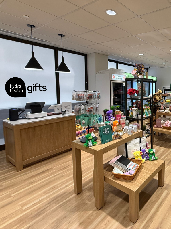 Hydra Health Gifts checkout and tables of merchandise