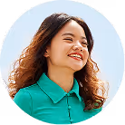 Alessia Tan, Zoey nutritionist, smiling in green top with circular crop