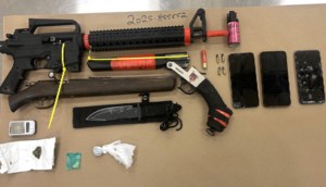 Two Sask. residents arrested after RCMP find loaded rifles in Lloyd