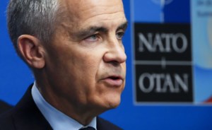Defence spending will lift Canada's economy, but not out of a recession: report