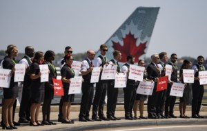 Air Canada flight attendants could serve strike notice after midnight tonight