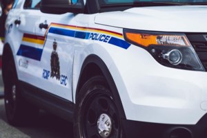 Three charged after stolen truck found in a field