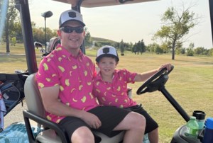Young golfers show skills at parent-child tournament
