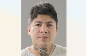Police search for two suspects following robbery with firearm