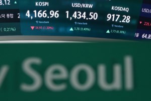Asian shares sink after losses for Big Tech pull US stocks lower