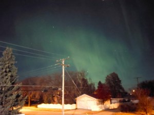 Northern lights dance, brighten nighttime Outlook sky