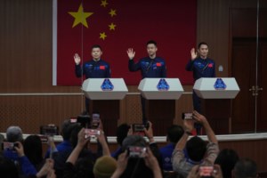 Chinese astronauts return from space station after delay blamed on space debris damage