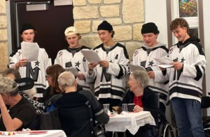 Hockey 'Stars' share happy holly-days with community’s seniors