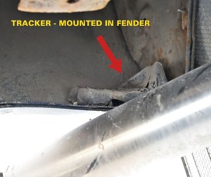 Man accused of placing GPS trackers on vehicles remains in custody