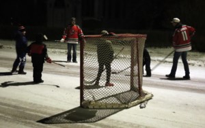 Young Canora players enjoy road hockey action with senior Cobras