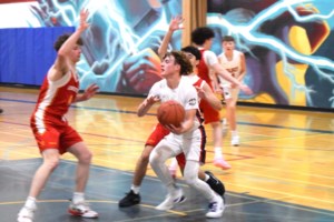 Elecs senior boys win twice at home basketball tournament