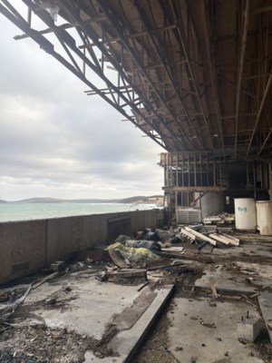 Rancid Newfoundland fish sauce plant will be cleaned up. Whose responsibility is it?
