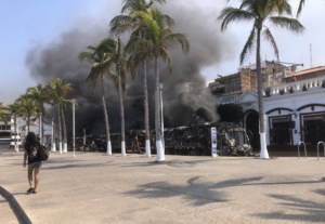 Canadian tourists sheltering in place in Mexico recount burnt-out cars, lines for food
