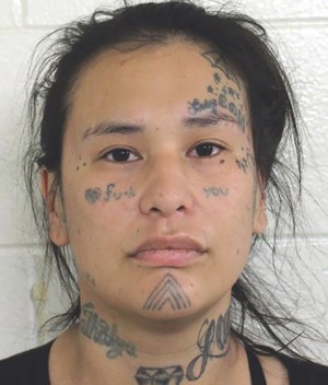 Convicted gang member wanted after breach, weapons offences