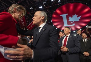 Carney issues call for unity, says no time for ‘politics as usual’