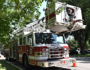 S'toon firefighters use aerial to access roof in house fire