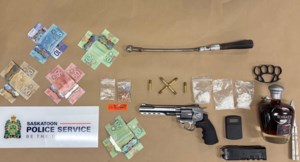 Cash, weapons, drugs, car seized