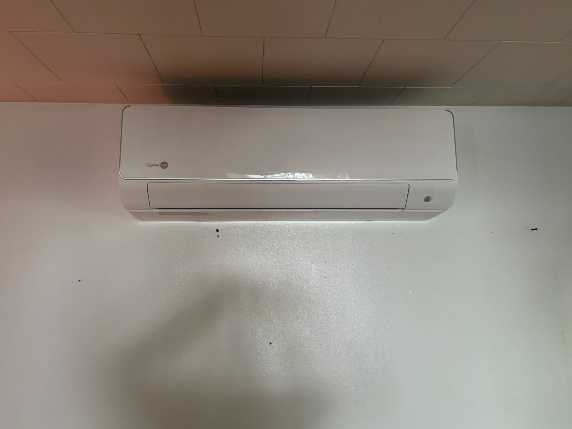 Tête de ventilation d'une thermopompe murale