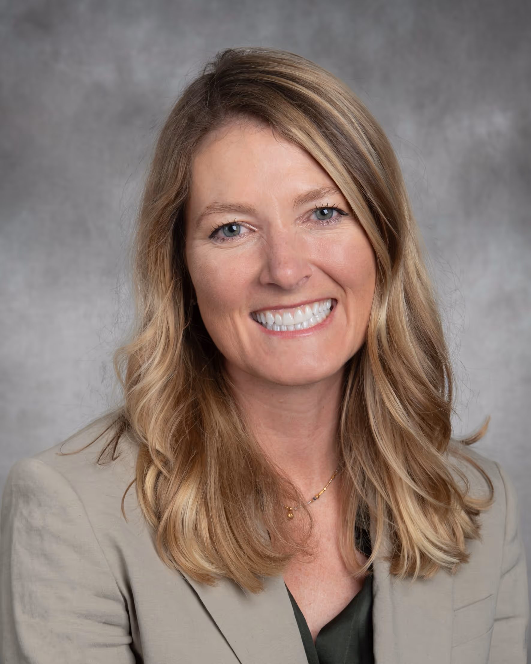Headshot of Sarah Abbott, Chief Legal Officer