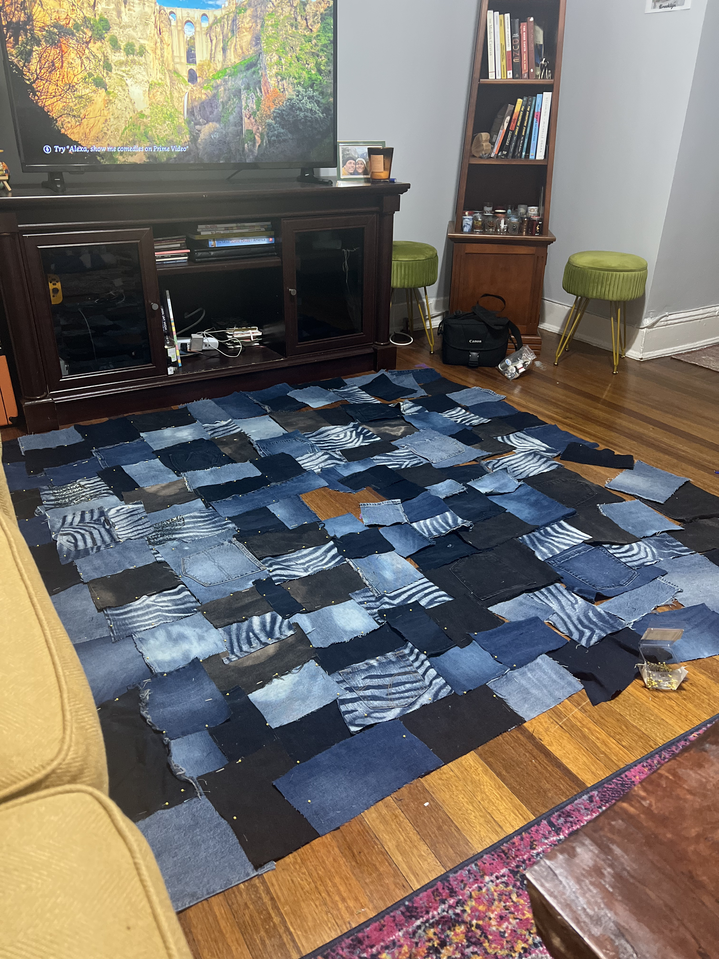 patchwork denim skirt pieces laid out on the floor to create mock up of skirt