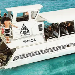Kauai Sea Tours boat on the Nā Pali Coast