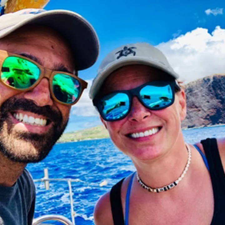 Greg Martin of Lani Shades with a companion on the ocean