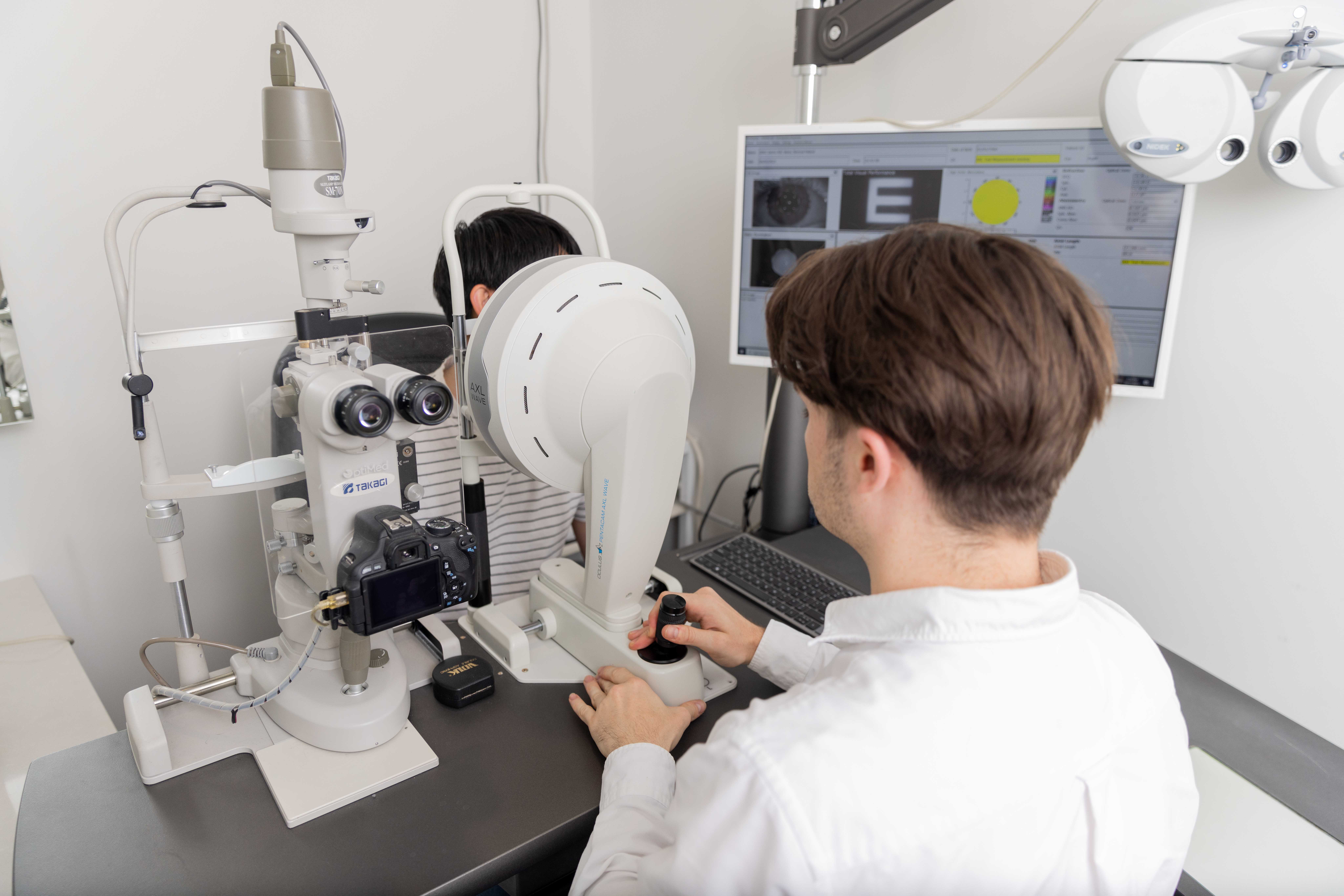Optometrist performing corneal scans for keratoconus diagnosis in Adelaide