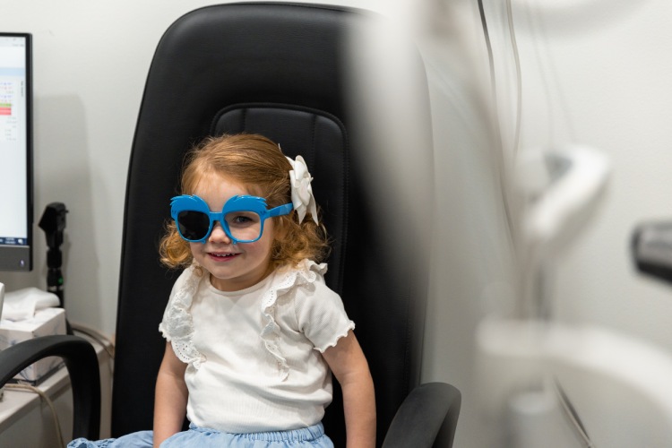 Young child wearing an eye patch during treatment for a lazy eye