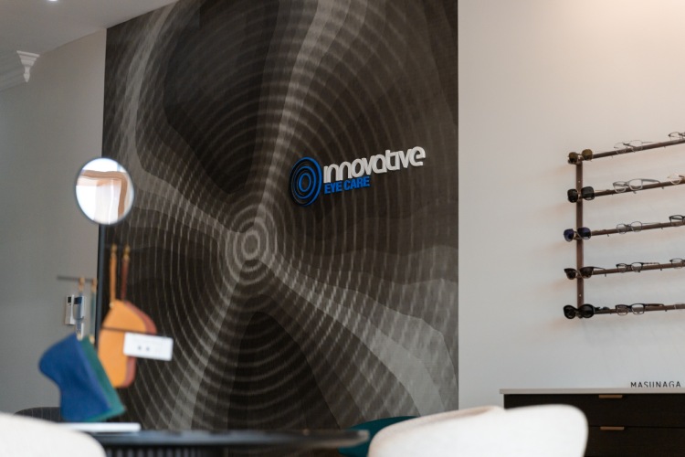 Innovative Eye Care clinic interior with children’s glasses on display