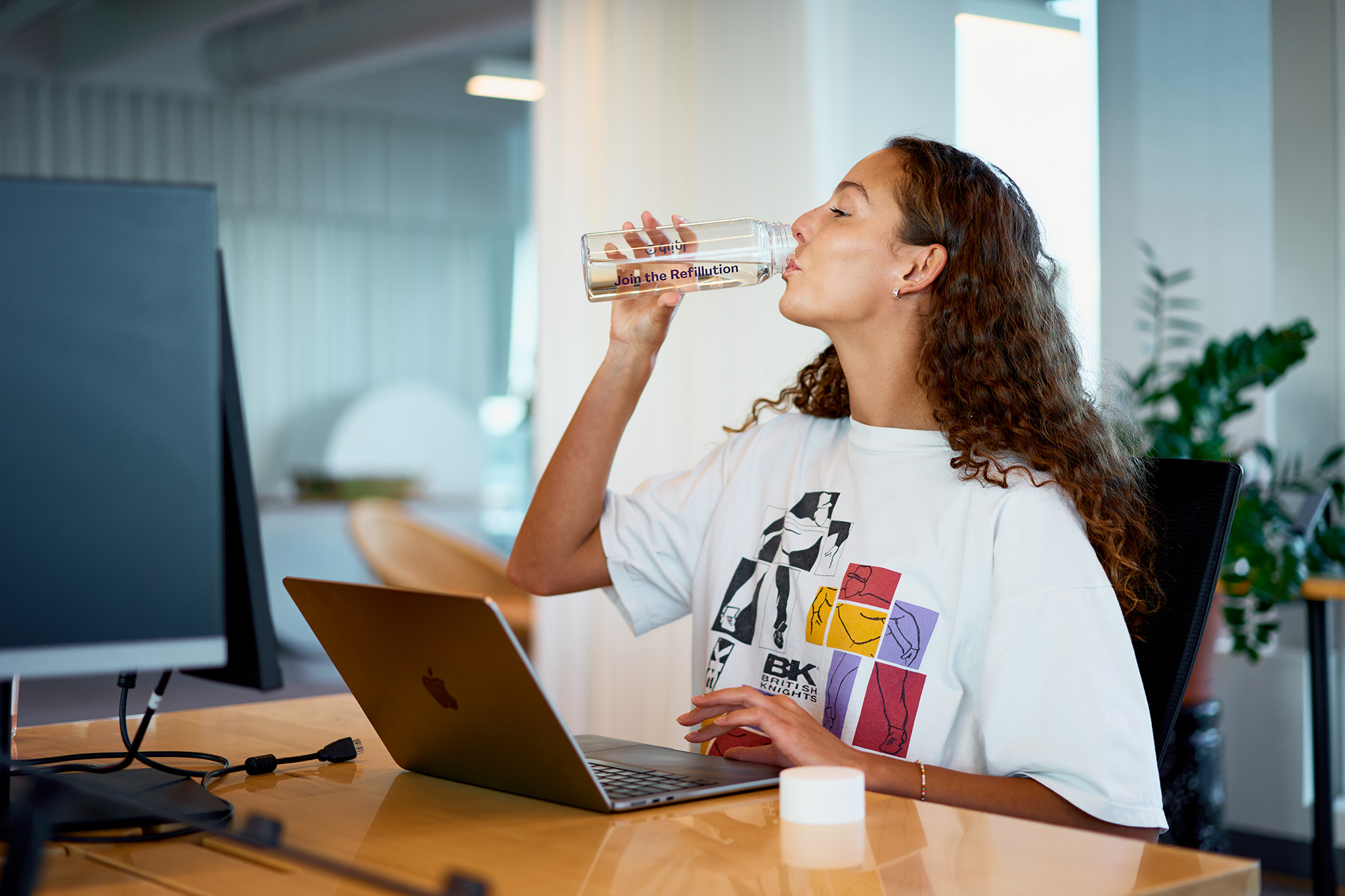 Woman drinking Dripl drink