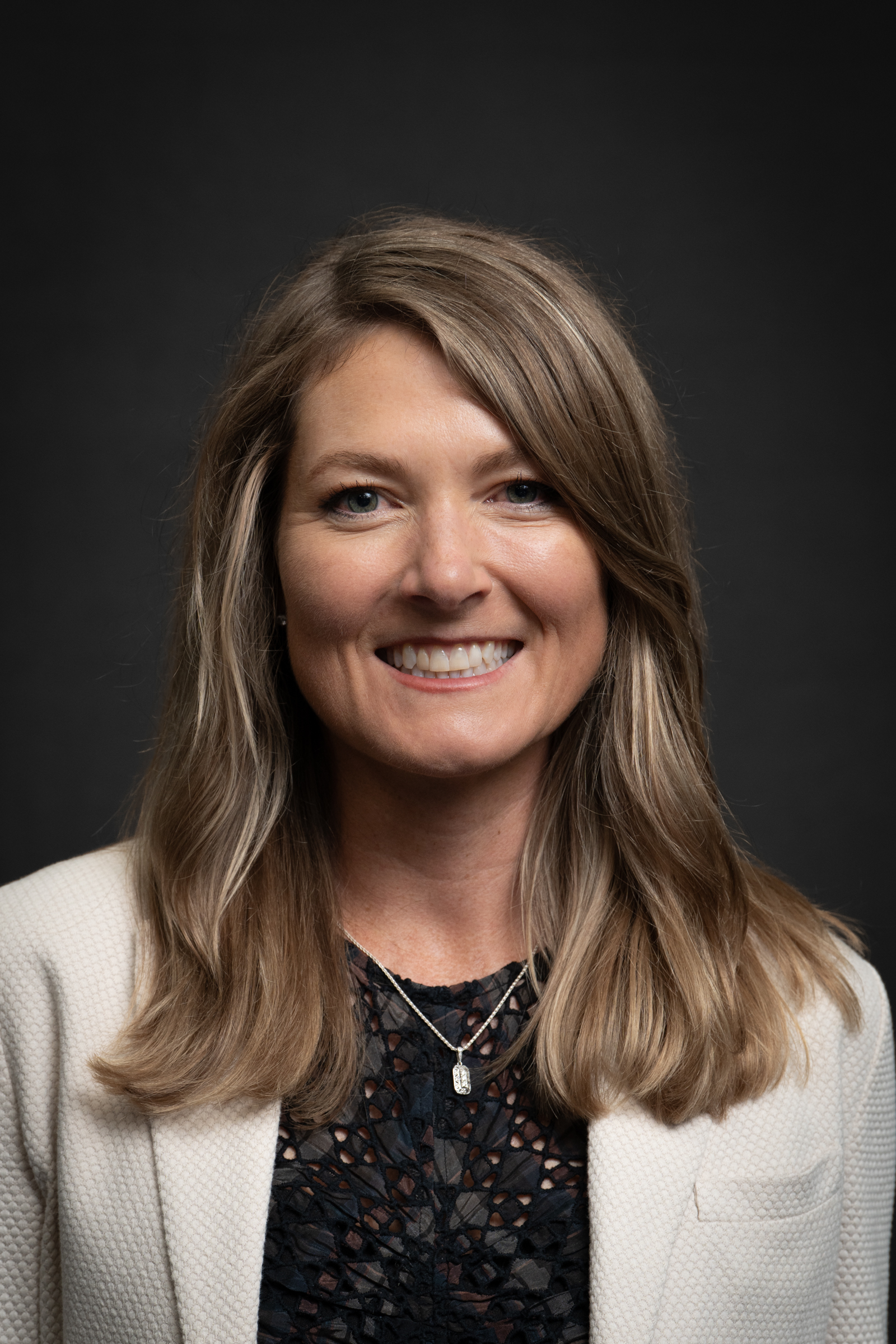 Headshot of Sarah Abbott, Chief Relations Officer