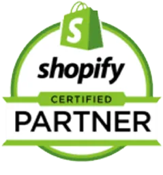 A circular badge features a green shopping bag with a white "S" at the top. Below, the text reads "Shopify Certified Partner" in green and black within the circle. The badge, emblematic of our AI-infused digital marketing expertise, is outlined in green with additional green horizontal bars accentuating the text.