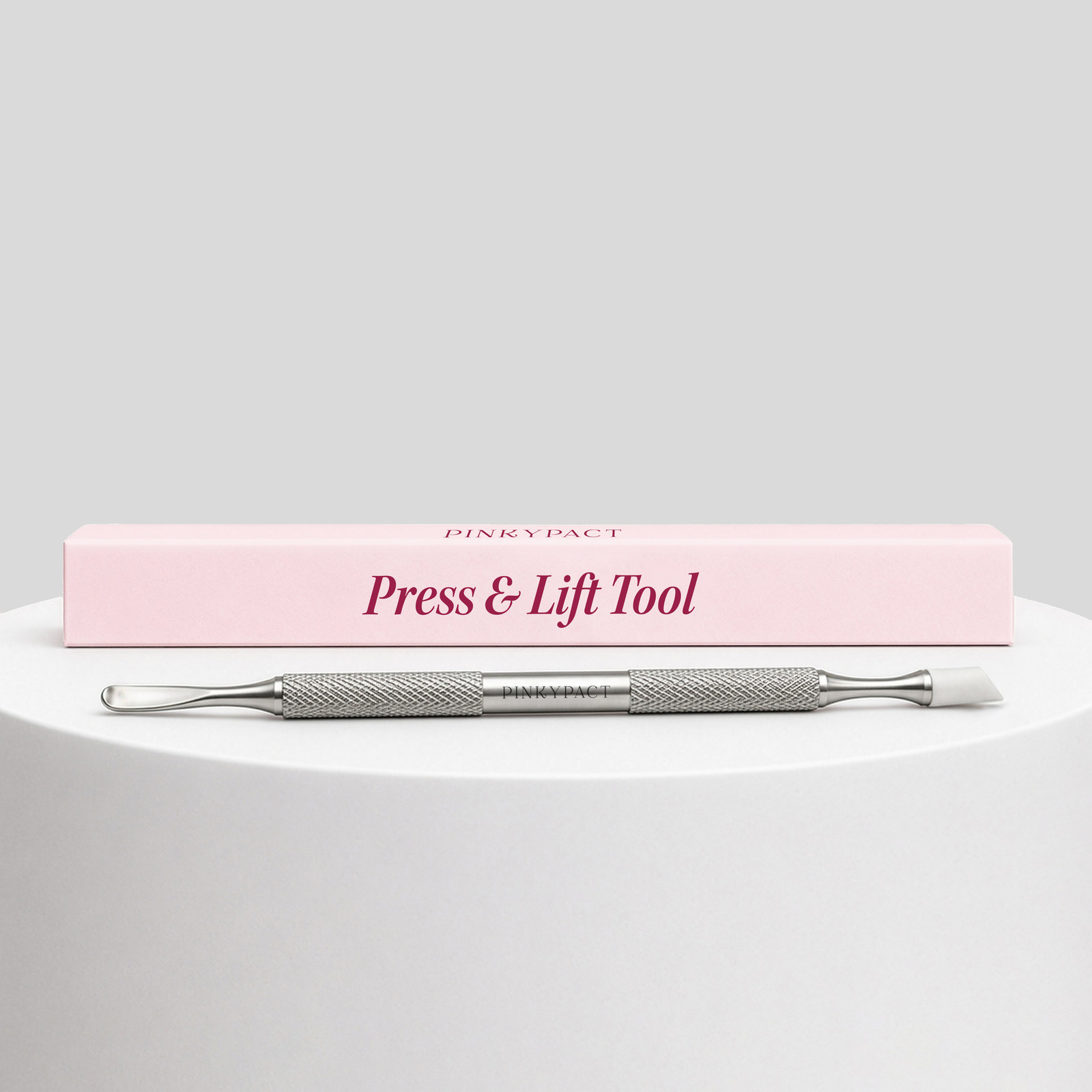 PINKYPACT Press & Lift tool with pink packaging
